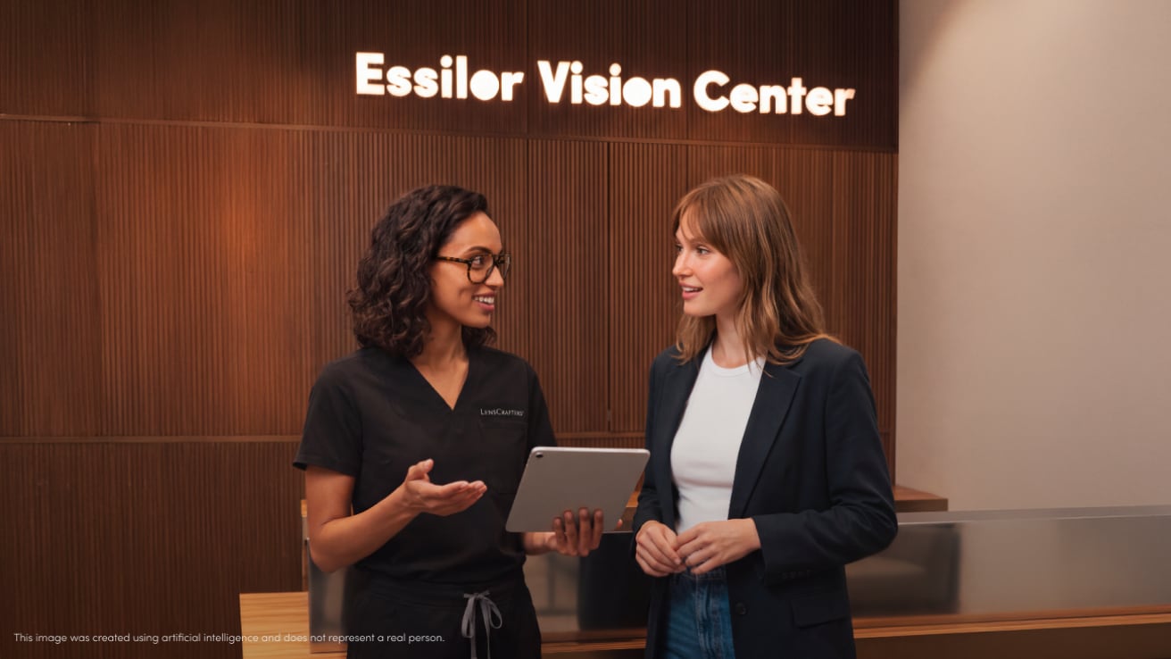 LensCrafters associate helping a customer schedule a visit